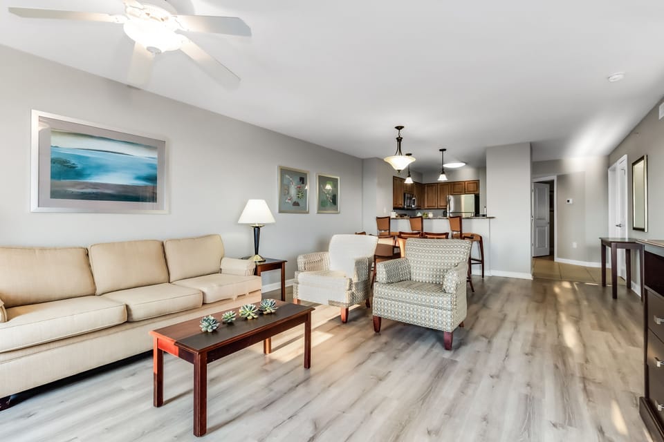 Unwind in your spacious living area with plush seating and an open-concept design that flows seamlessly into your fully-equipped kitchen.