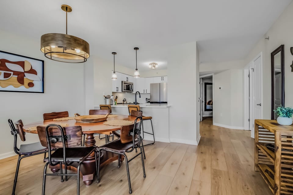 Your open-concept dining and kitchen space features modern amenities and stylish furnishings, perfect for sharing meals and creating memories together.