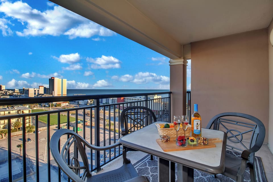 Step onto your private balcony where ocean breezes meet city views. Sip wine as you watch the world below.