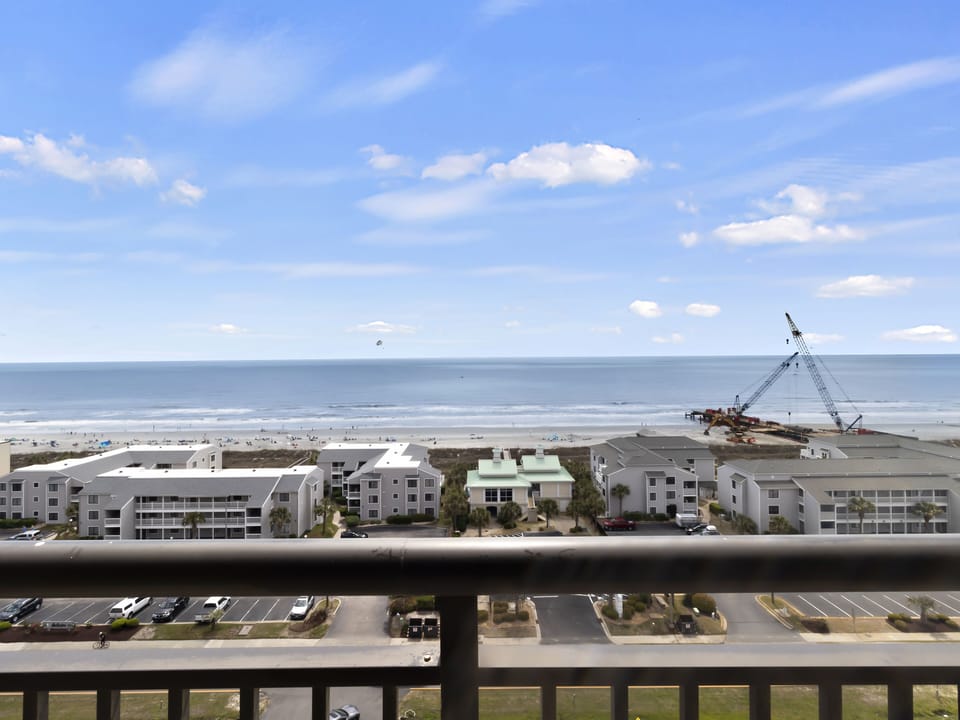 Stunning ocean views stretch endlessly before you from your private balcony, where coastal breezes and endless blue horizons create the perfect escape.