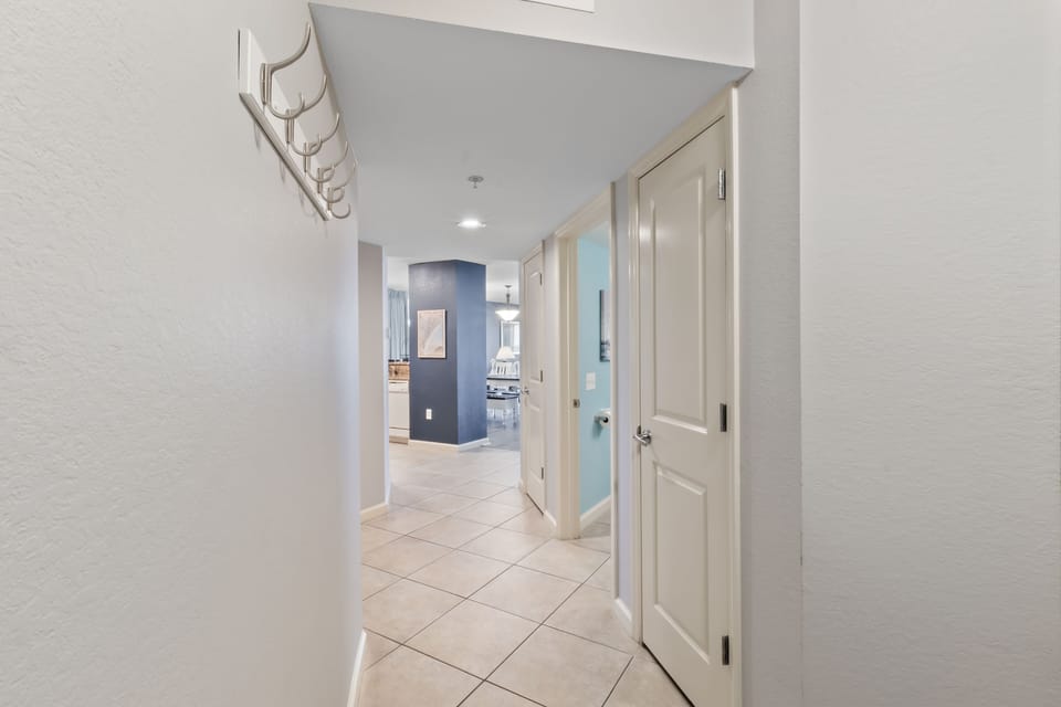 Step into your bright, welcoming hallway where clean lines and modern touches create a peaceful flow between spaces.