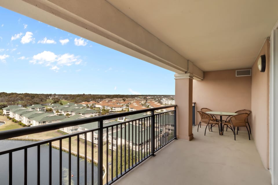Enjoy panoramic views from your private balcony, where morning coffee and evening conversations come naturally in this elevated sanctuary.