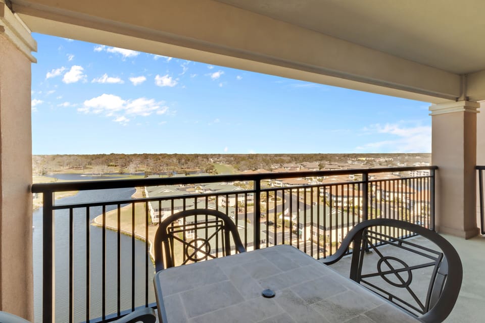 Enjoy your morning coffee on this spacious balcony, where stunning lake views stretch across the horizon.
