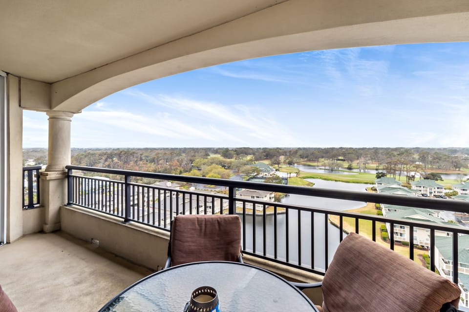 Your private balcony offers sweeping views of rolling hills and waterfront - perfect for morning coffee or evening relaxation.