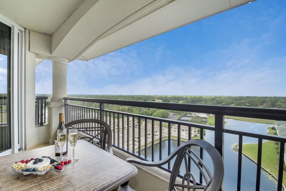 Sip wine and savor fresh fruit on your private balcony, overlooking serene water views and lush landscapes.