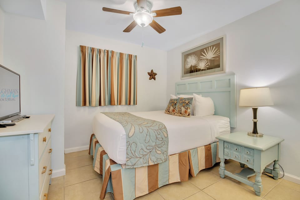 Drift off in this serene coastal bedroom, where soft colors and ocean-inspired decor create your perfect seaside sanctuary.