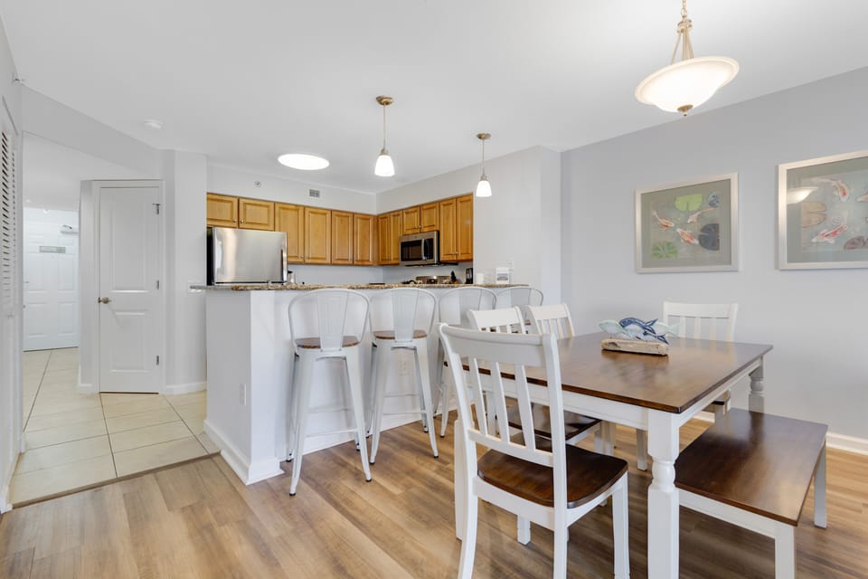 Gather around your spacious kitchen island for morning coffee or prepare memorable meals in this bright, open-plan space with modern appliances.