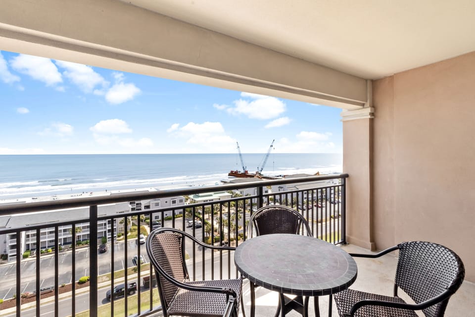 Your private oceanfront balcony awaits with breathtaking sea views, perfect for morning coffee or sunset drinks while watching waves kiss the shore.