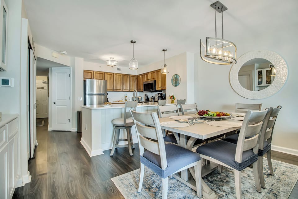 Gather around your spacious dining table while the chef prepares meals in the gorgeous open kitchen.