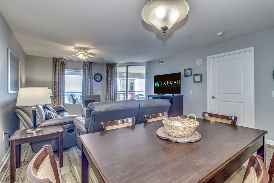 Your spacious living area seamlessly blends dining and relaxation, with comfortable seating and modern amenities for memorable gatherings.