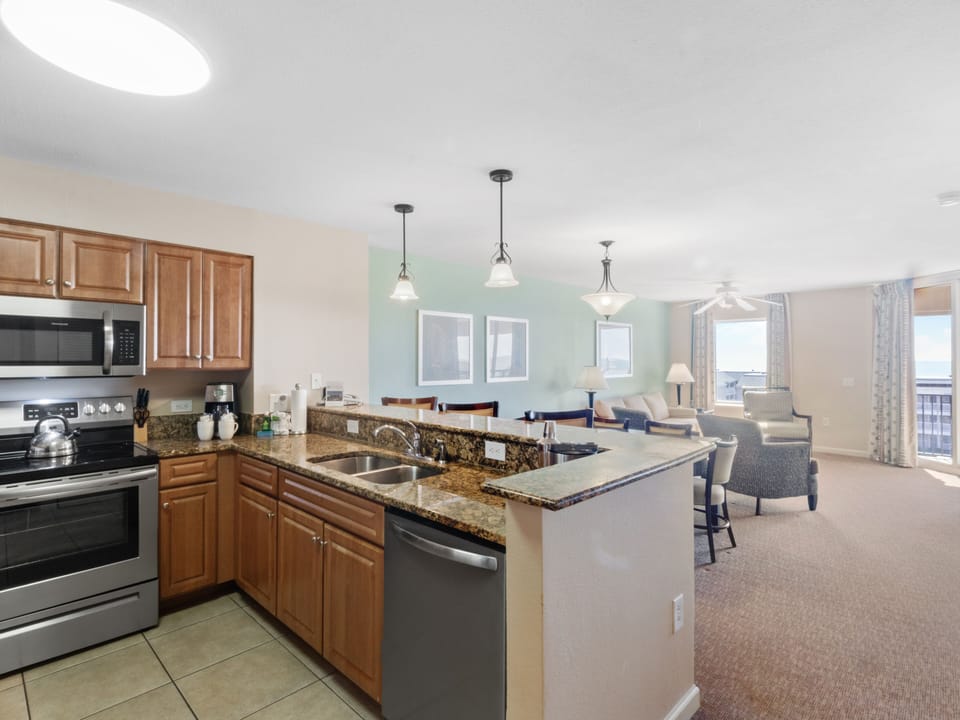 Relax in your open-concept suite with granite counters, full kitchen, and bright living space perfect for entertaining.
