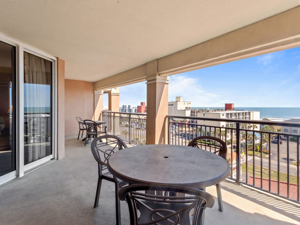 Your private balcony offers stunning ocean views and comfortable seating for morning coffee or evening relaxation.