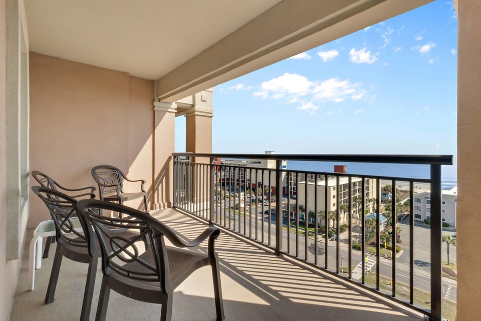 Sip your morning coffee on your private balcony while taking in sweeping views of the coastal community below.