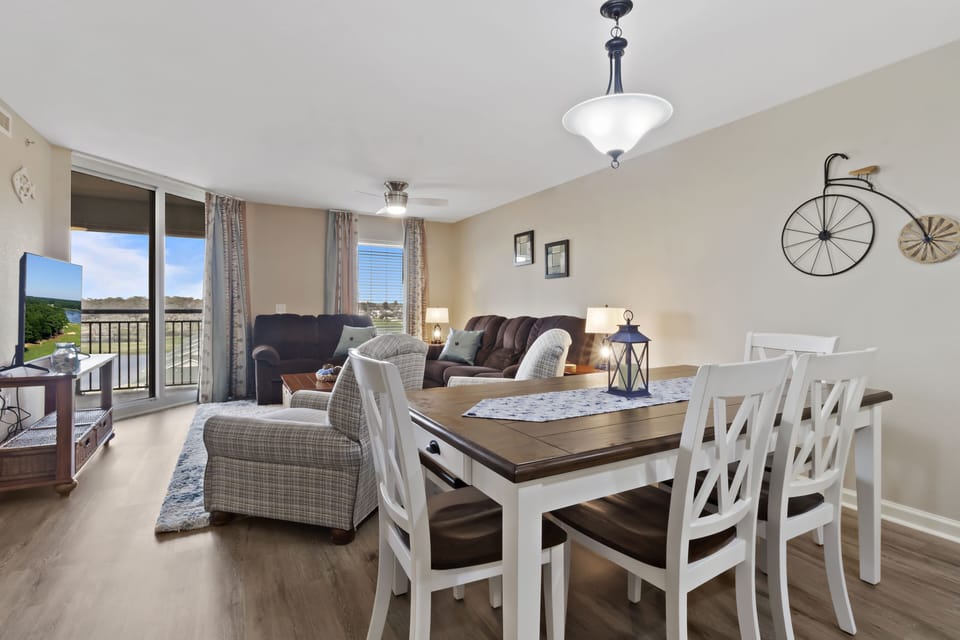 Relax in your bright open living space with cozy seating and dining for six, all while enjoying scenic views through the large balcony doors.