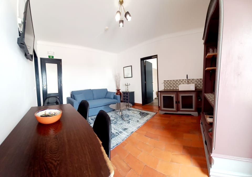 Panoramic Apartment, 1 Queen Bed, Non Smoking, Pool View | Living area | 85-cm flat-screen TV with digital channels, TV