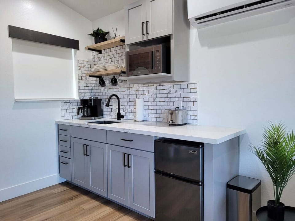 Kitchenette with coffee and cooking supplies