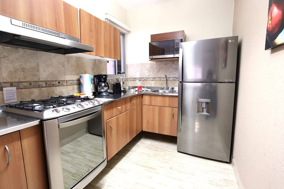 Full-size fridge, microwave, stovetop, toaster