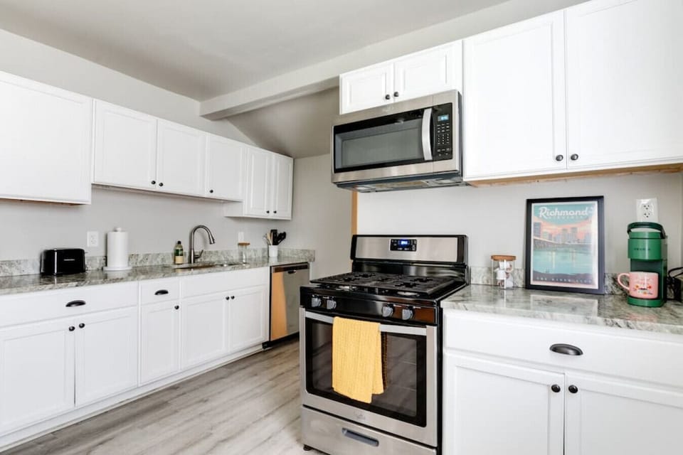 Fully stocked kitchen with everything you need — microwave, stove, dishwasher, fridge, Keurig, toaster, and plenty of cabinet space. Cook, sip, and savor with ease!-Fully stocked kitchen with everything you need