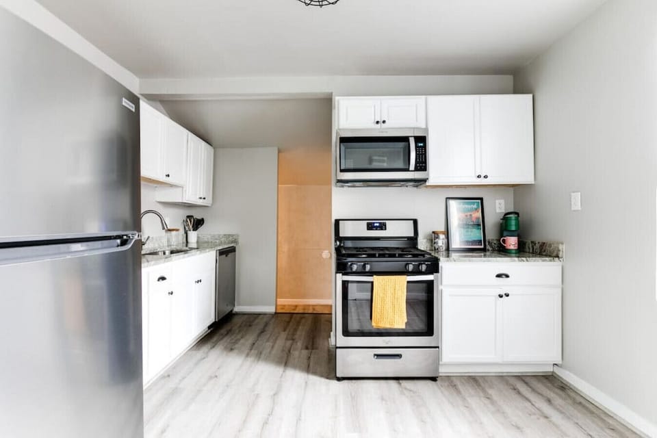 Fully stocked kitchen with everything you need — microwave, stove, dishwasher, fridge, Keurig, toaster, and plenty of cabinet space. Cook, sip, and savor with ease!-Fully stocked kitchen with everything you need