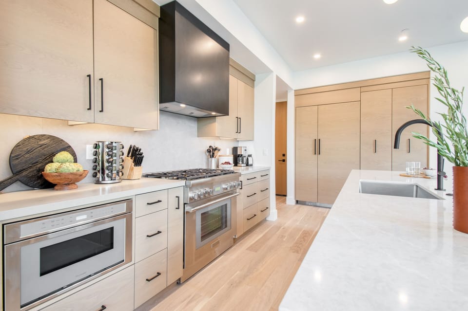 Modern appliances, including a large gas stove.