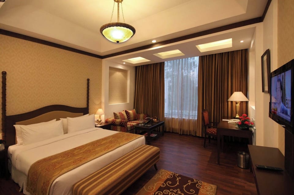 Premium bedding, down comforters, memory foam beds, in-room safe