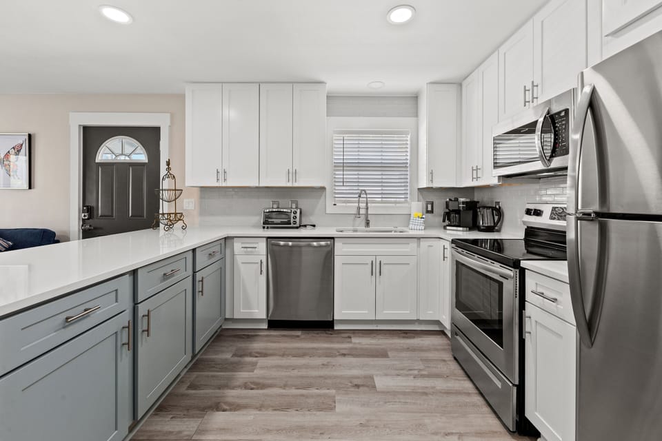 Apartment, Multiple Beds, Patio, Garden View | Private kitchen | Fridge, microwave, oven, stovetop