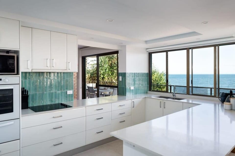 Experience culinary bliss in a kitchen with a view that's truly inspiring.