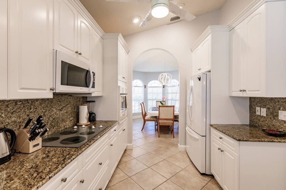 The kitchen has access to a formal dining area.