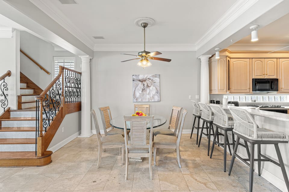 Gather around the spacious dining table for memorable meals, then enjoy casual conversations at your kitchen island—perfect for morning coffee or evening wine.