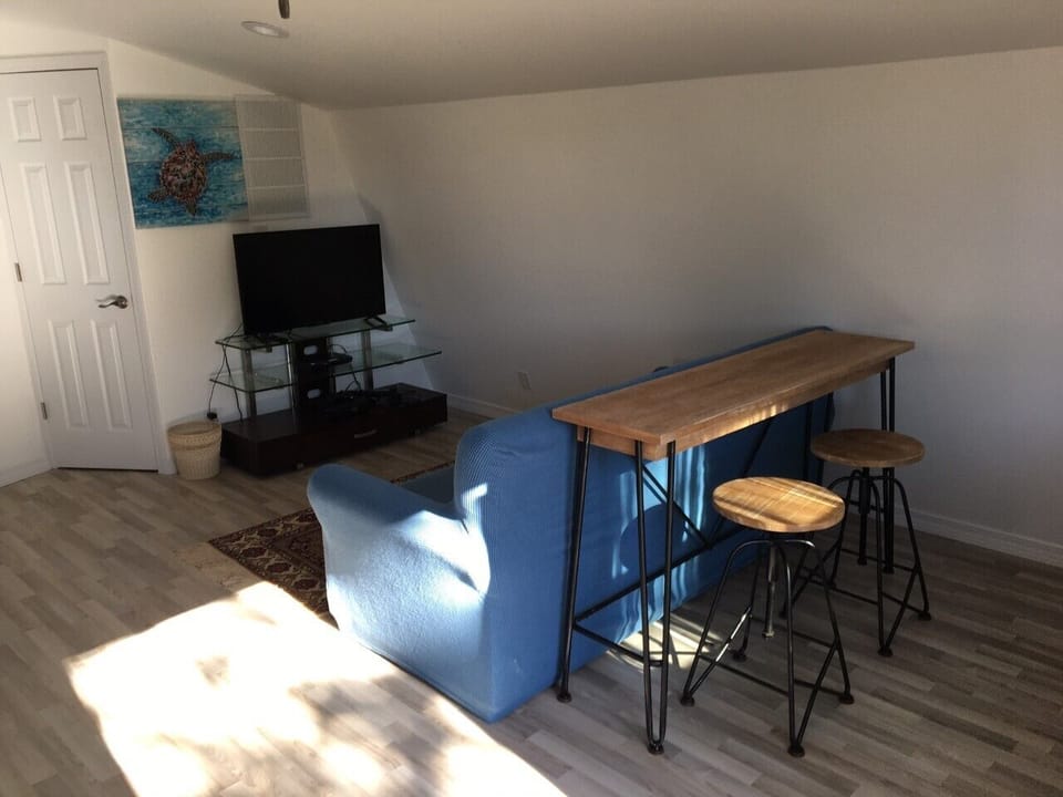 Inside Cabana. TV and small breakfast nook.