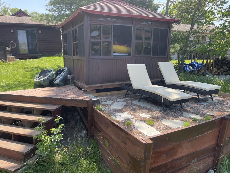 Water toy storage plus a sun bathing platform overlooking the water.