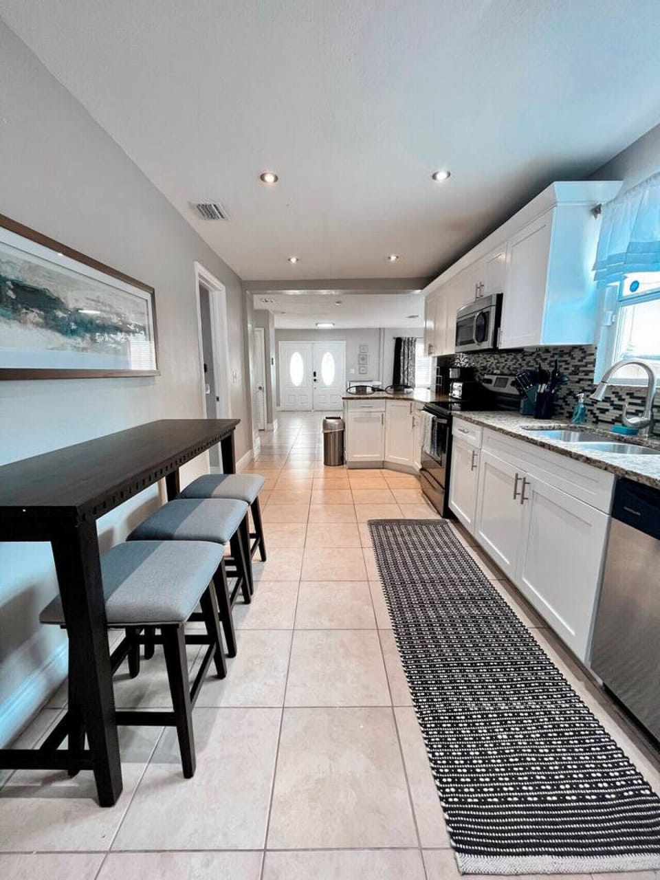 Spacious Kitchen Area w/ Large Cabinet Space & Nonstick Aluminum Cookware(not pictured)