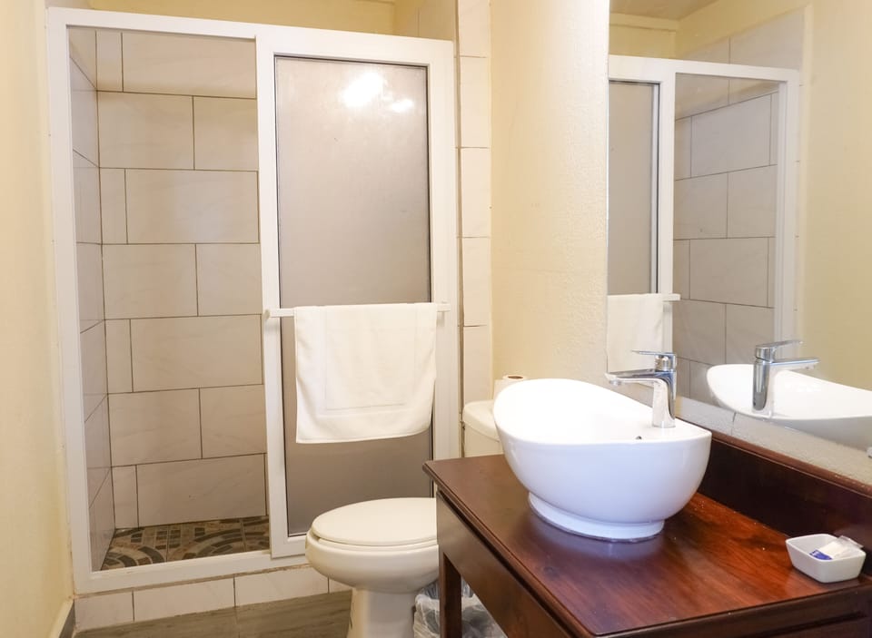 Double Room, 2 Queen Beds, Ocean View | Bathroom | Shower, free toiletries, hair dryer, towels