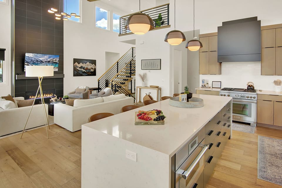 Open-concept living and kitchen space with designer finishes and plenty of natural light for effortless entertaining.