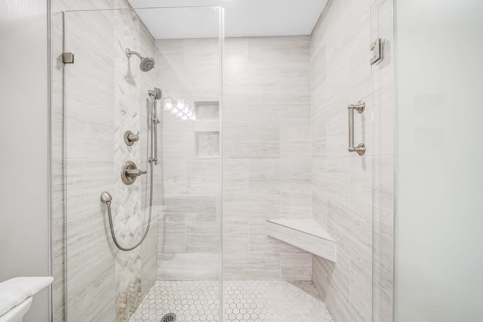 No wimpy water pressure here. Enjoy a luxurious spa shower with two shower heads