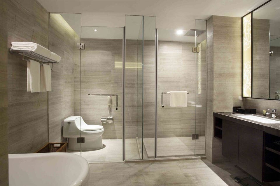 Shower, rainfall showerhead, towels