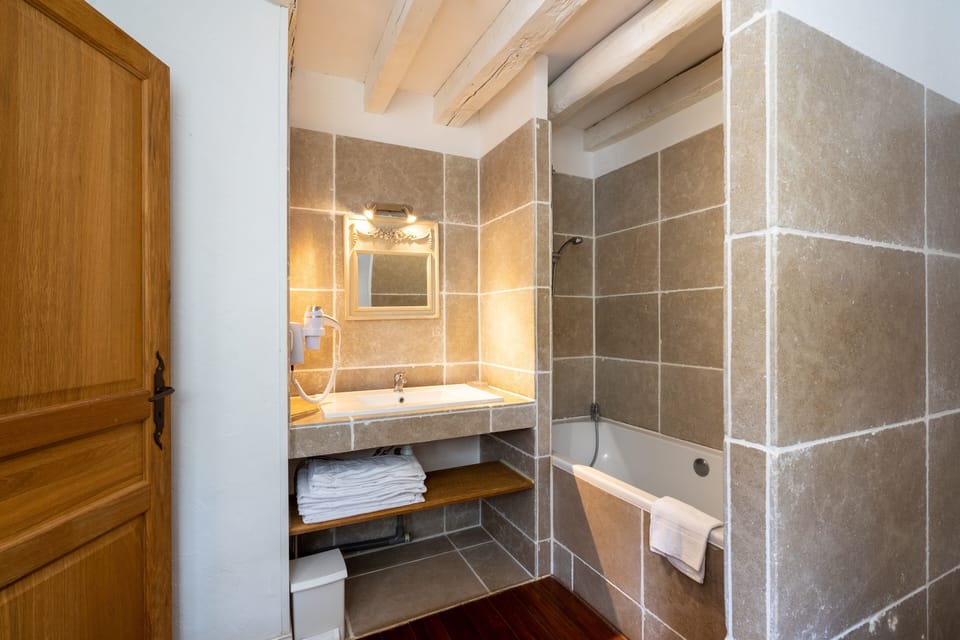 Family Apartment | Bathroom | Hair dryer, towels, soap, toilet paper