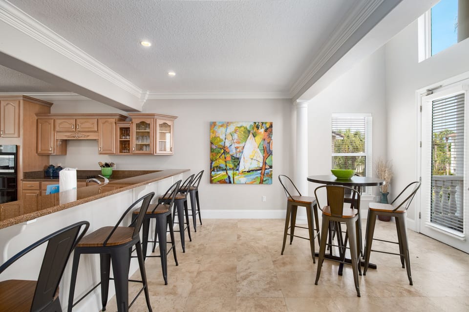 Your gourmet kitchen and dining area create the perfect gathering space for memorable meals and morning coffee.