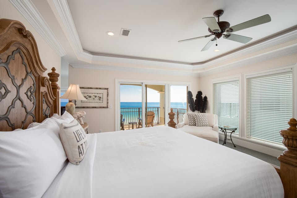 Wake up to stunning ocean views from your luxurious bedroom, where elegant furnishings meet coastal charm for the perfect seaside retreat.