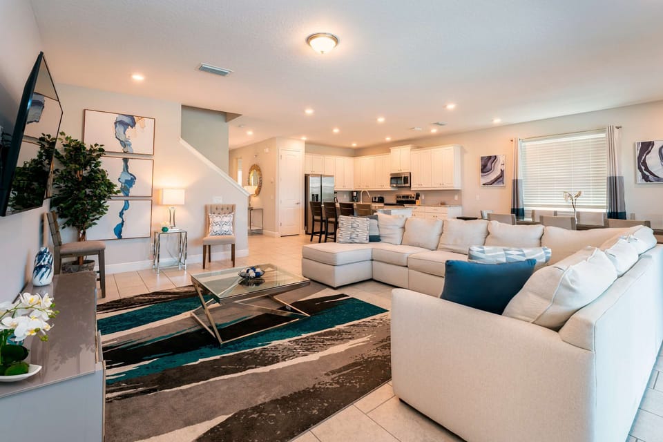 Elegant living area with plush seating and open layout, ideal for gatherings and relaxation.