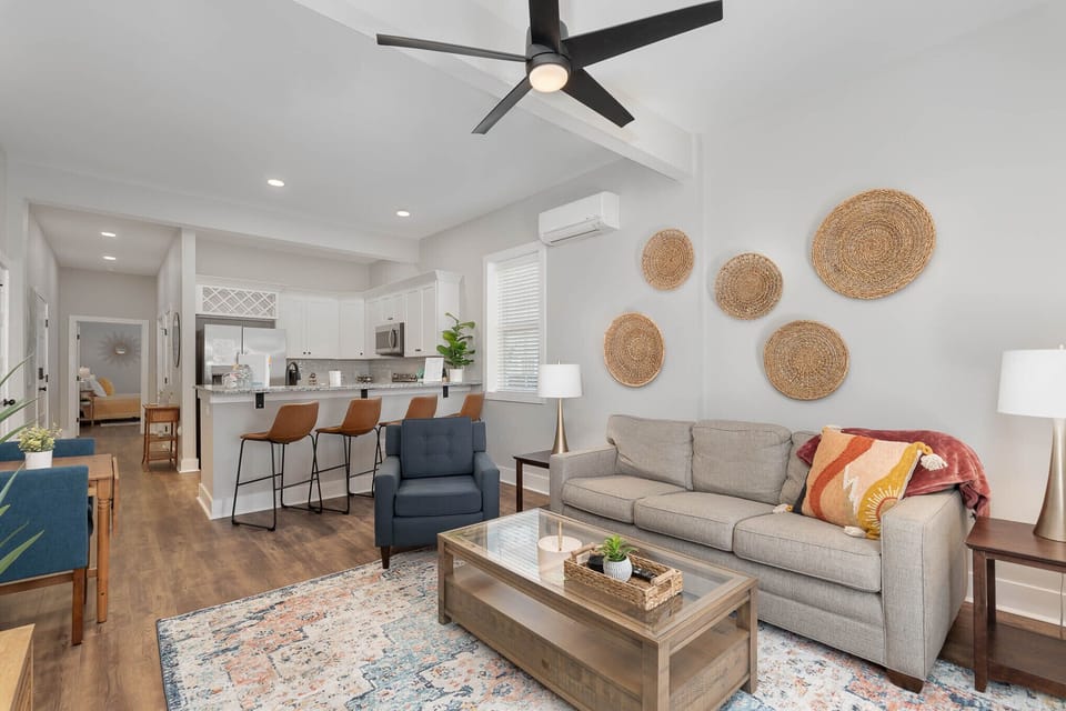 Bright and open space with living room, dining areas and full-sized kitchen.