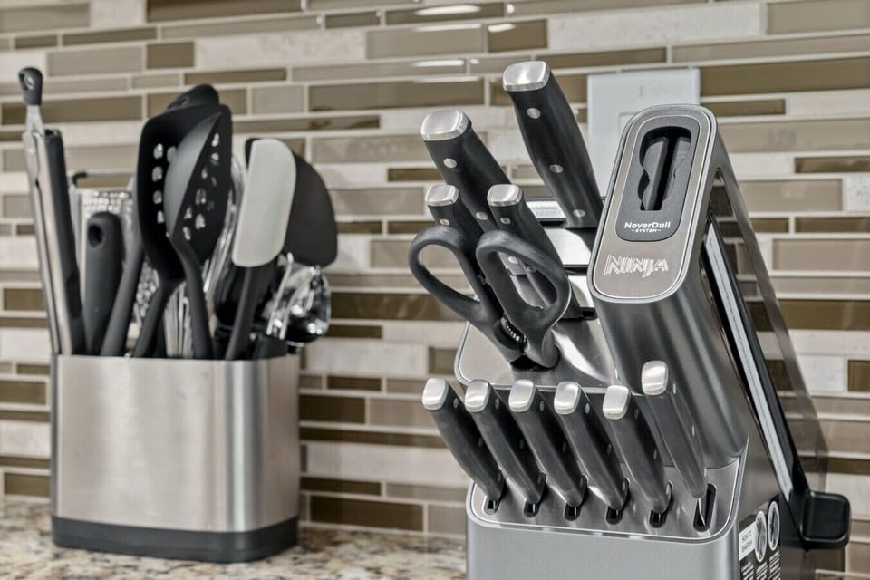 Chop, slice, and serve like a pro—Ninja knives and a fully stocked kitchen keep meals simple at Hogan Haven in Point Venture.