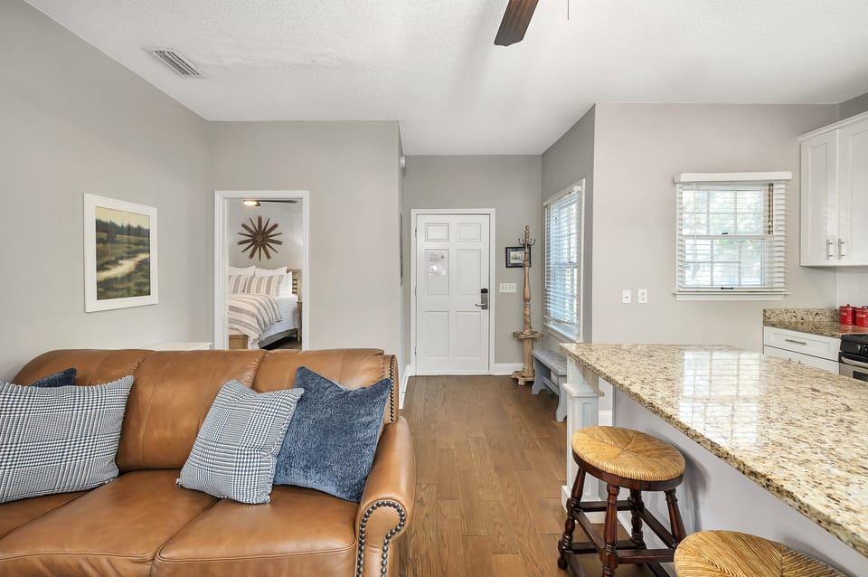 Open kitchen and living area with island seating