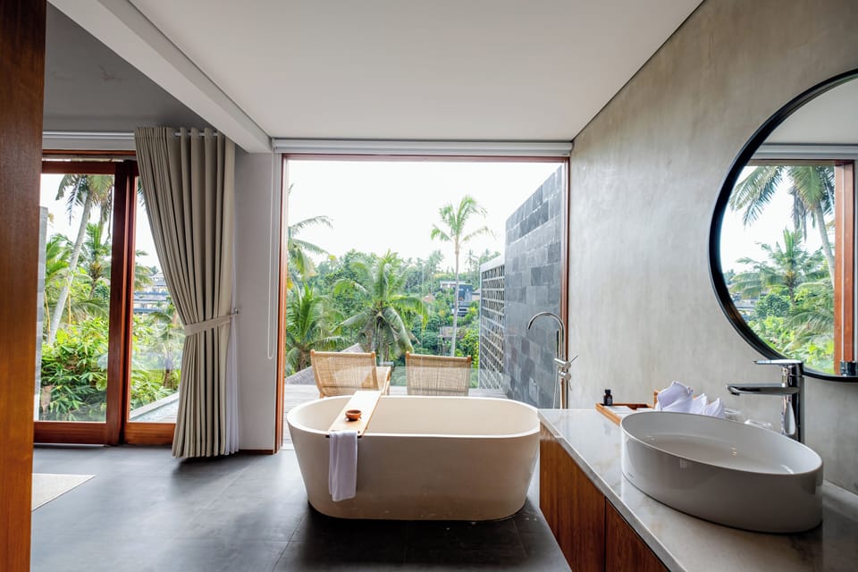 Shower, bathrobes, slippers, towels