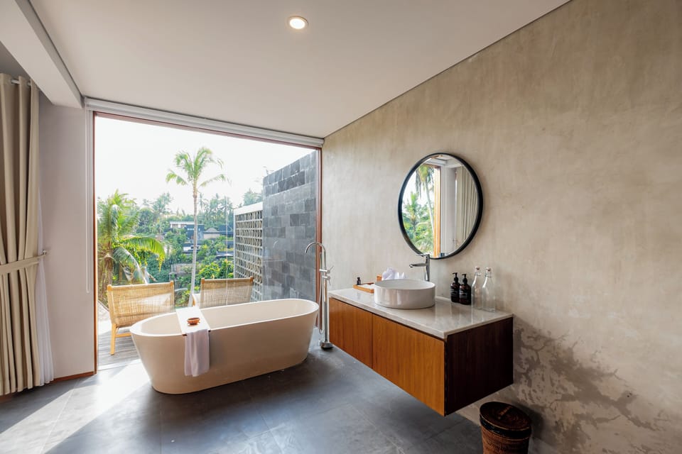 Shower, bathrobes, slippers, towels