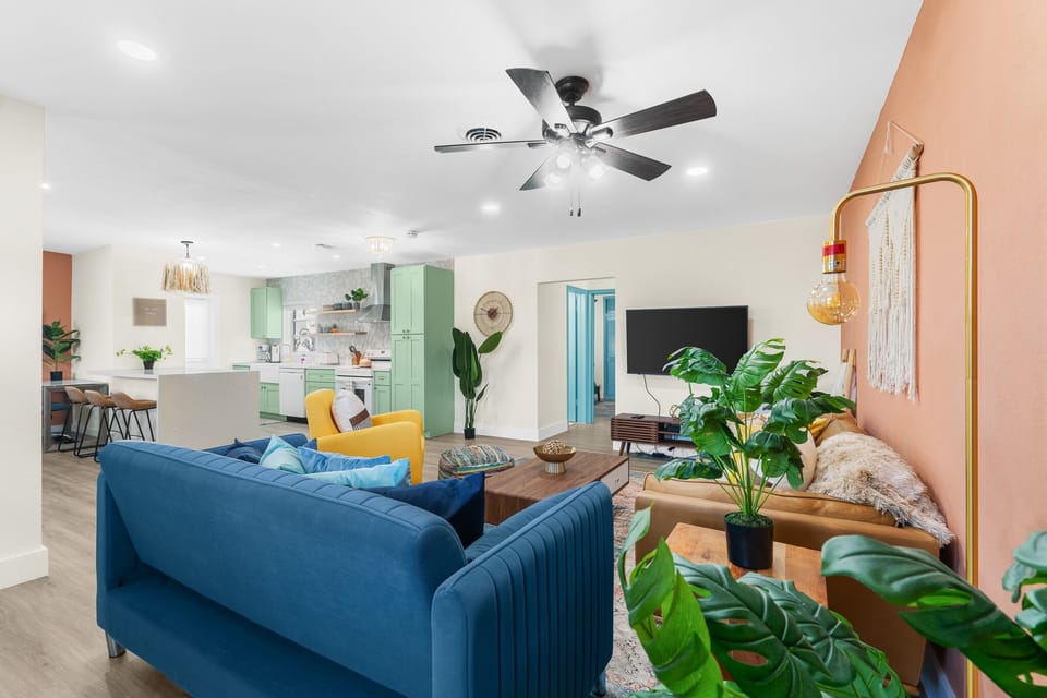 This living room is all about casual comfort and good times. Watch, play, or just kick back after a day at the beach.