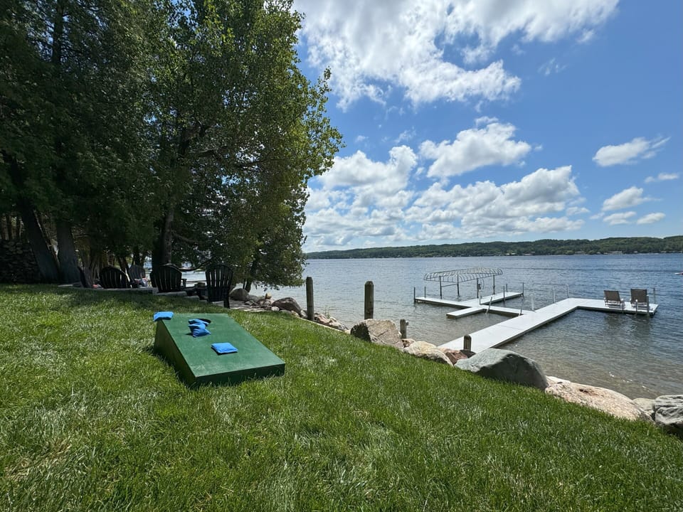 Enjoy a game of cornhole along the lakefront