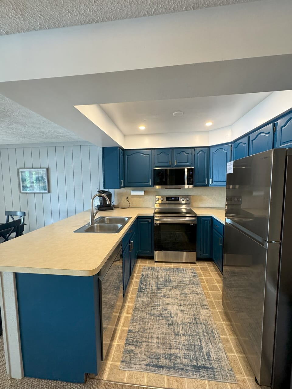 Fully equipped kitchen with new stainless-steel appliances