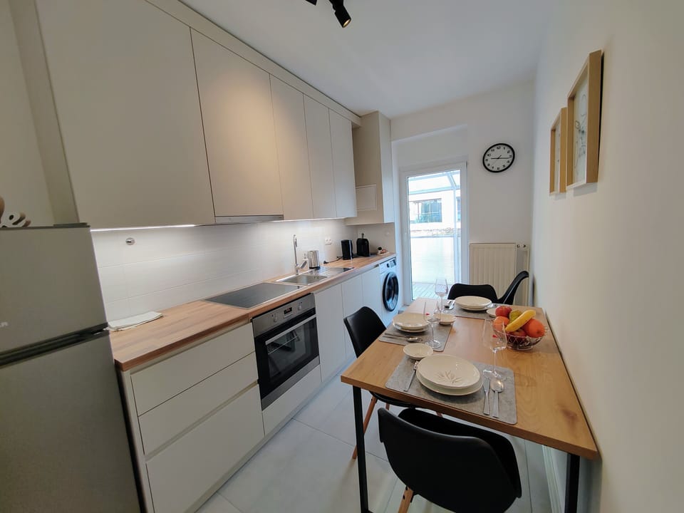 Apartment | Private kitchen | Fridge, oven, stovetop, dishwasher