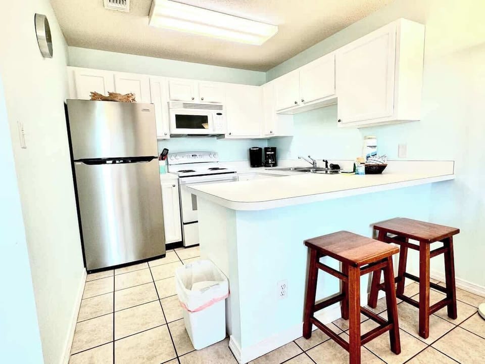 Enjoy gathering at the breakfast bar for a quick bite with seating for 2.